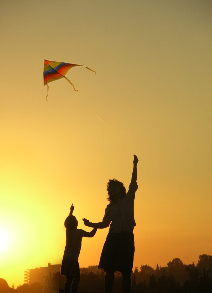 kite, play, family, happy, childhood, happy mothers day, kid, sky, flying, playful, together, summer, child, parent, woman, nature, mother, happiness, activity, game, fun, outdoors, sunset, silhouette, mom, mum